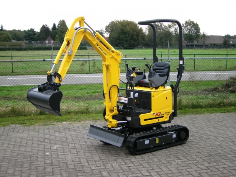 New Holland minigraver 1000 kg.
